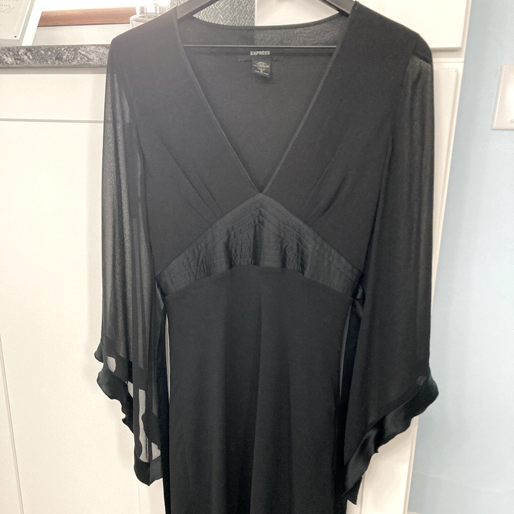 Used Black Express 3/4 sleeve Silk Dress with Satin Size 8 Great Condition